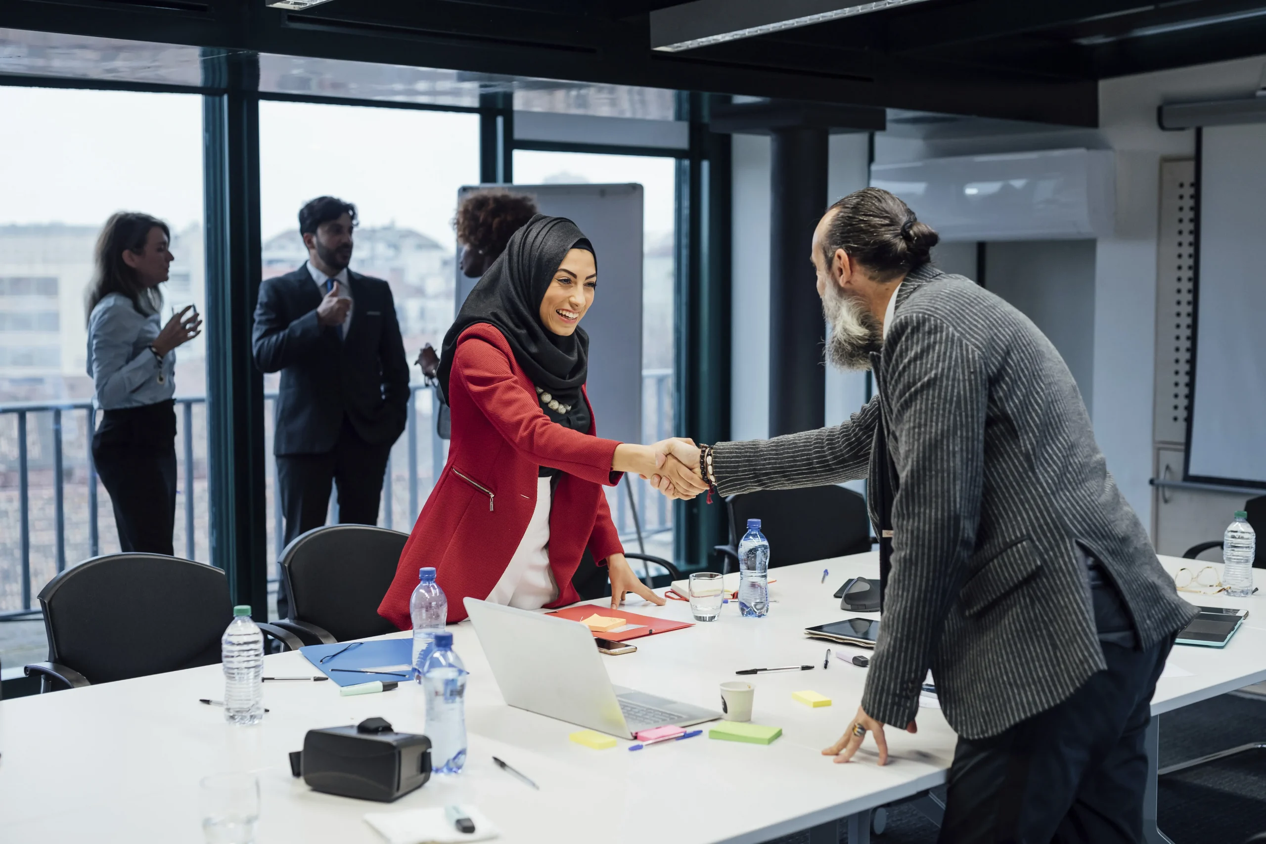 business partners shaking hands at meeting in offi 2025 04 04 15 48 11 utc scaled